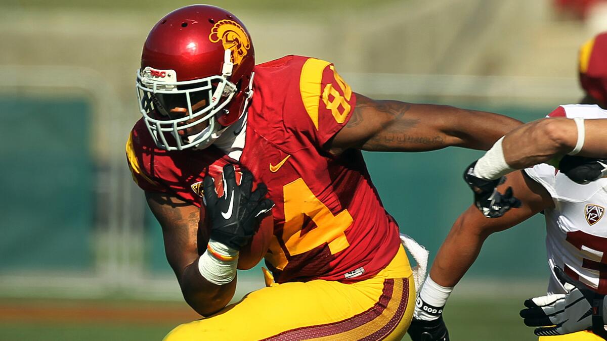 USC wide receiver Darreus Rogers carries the ball during the Trojans' spring game at the Coliseum in April.