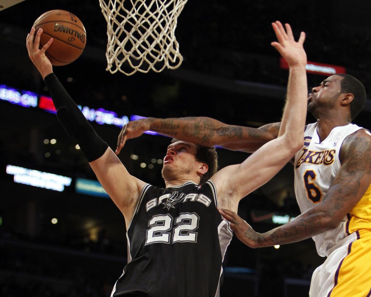 Tiago Splitter, Earl Clark