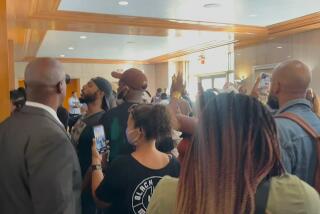 Protesters briefly disrupt Board of Supervisors meeting