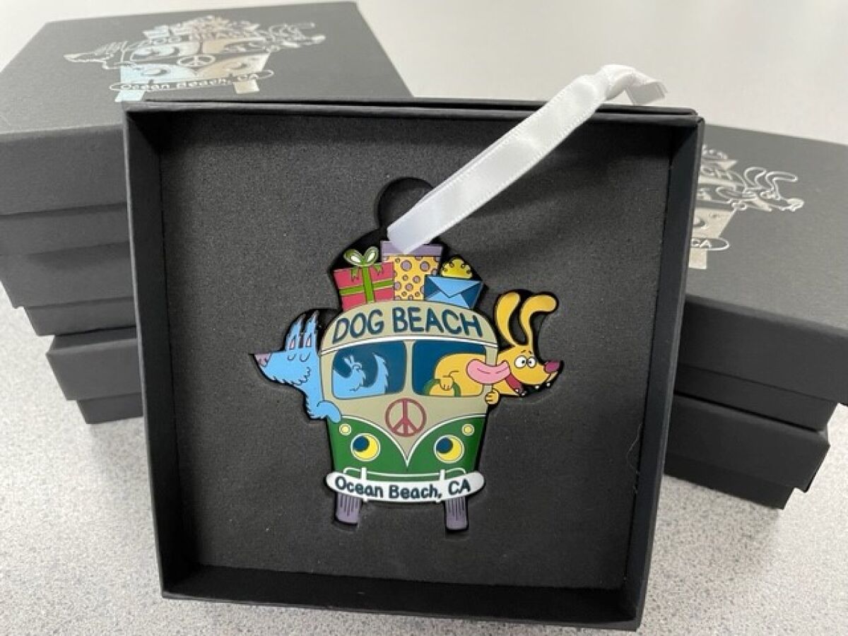 This Ocean Beach holiday ornament features a couple of pups in a Volkswagen van headed to Dog Beach.