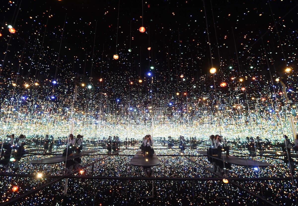 An installation view of Yayoi Kusama's "Infinity Mirrored Room - The Souls of Millions of Light Years Away," which has turned out to be a highly popular attraction at the new Broad museum.