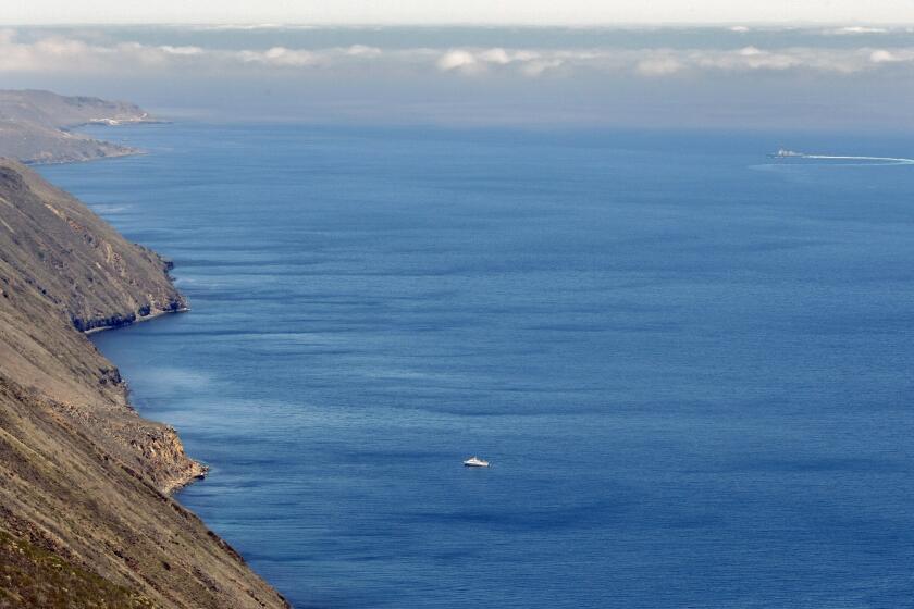 JULY 17, 2013. SAN CLEMENTE ISLAND, CA. A U.S. Navy destroyer cuts a circuitous path during a training exercise off the east coast of San Clemente Island. This view from the Stone Station high point on the 21-mile long island looks north. (Don Bartletti / Los Angeles Times)