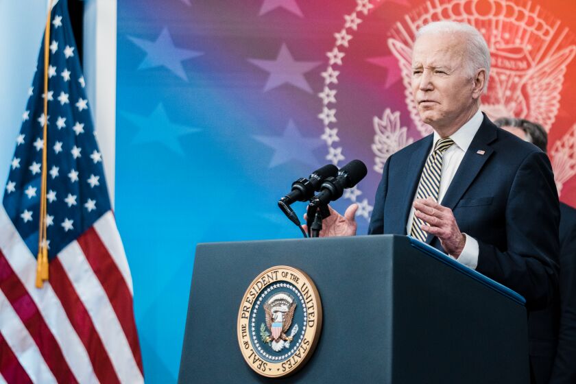 President Joe Biden, center, delivers remarks on Ukraine