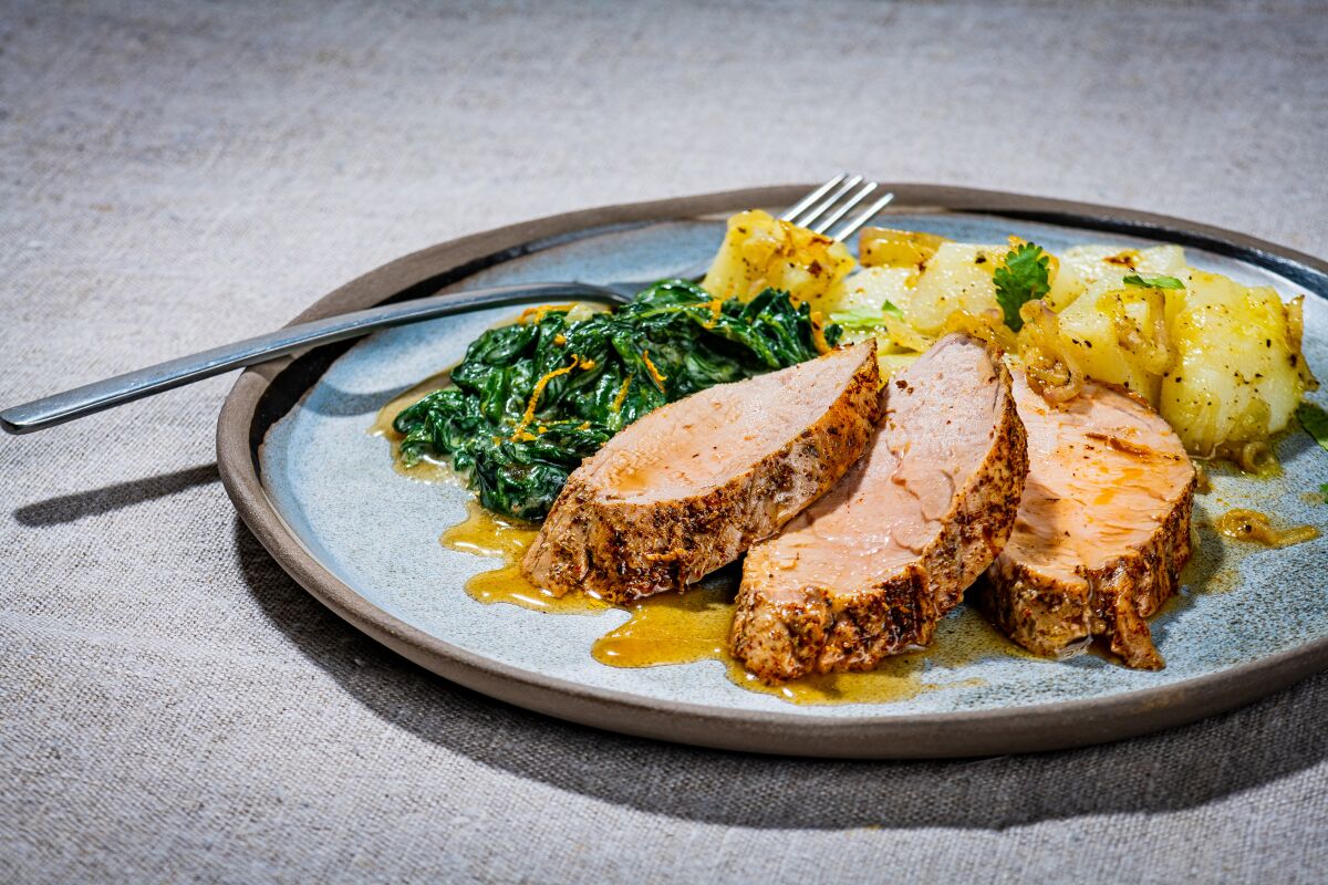 A pernil-style pork tenderloin that conjures the smells of a ...