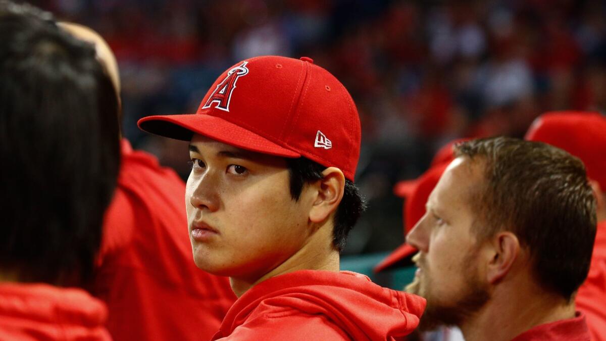 The Angels' Shohei Ohtani, shown in the dugout earlier this month, took 33 swings in batting practice Friday.