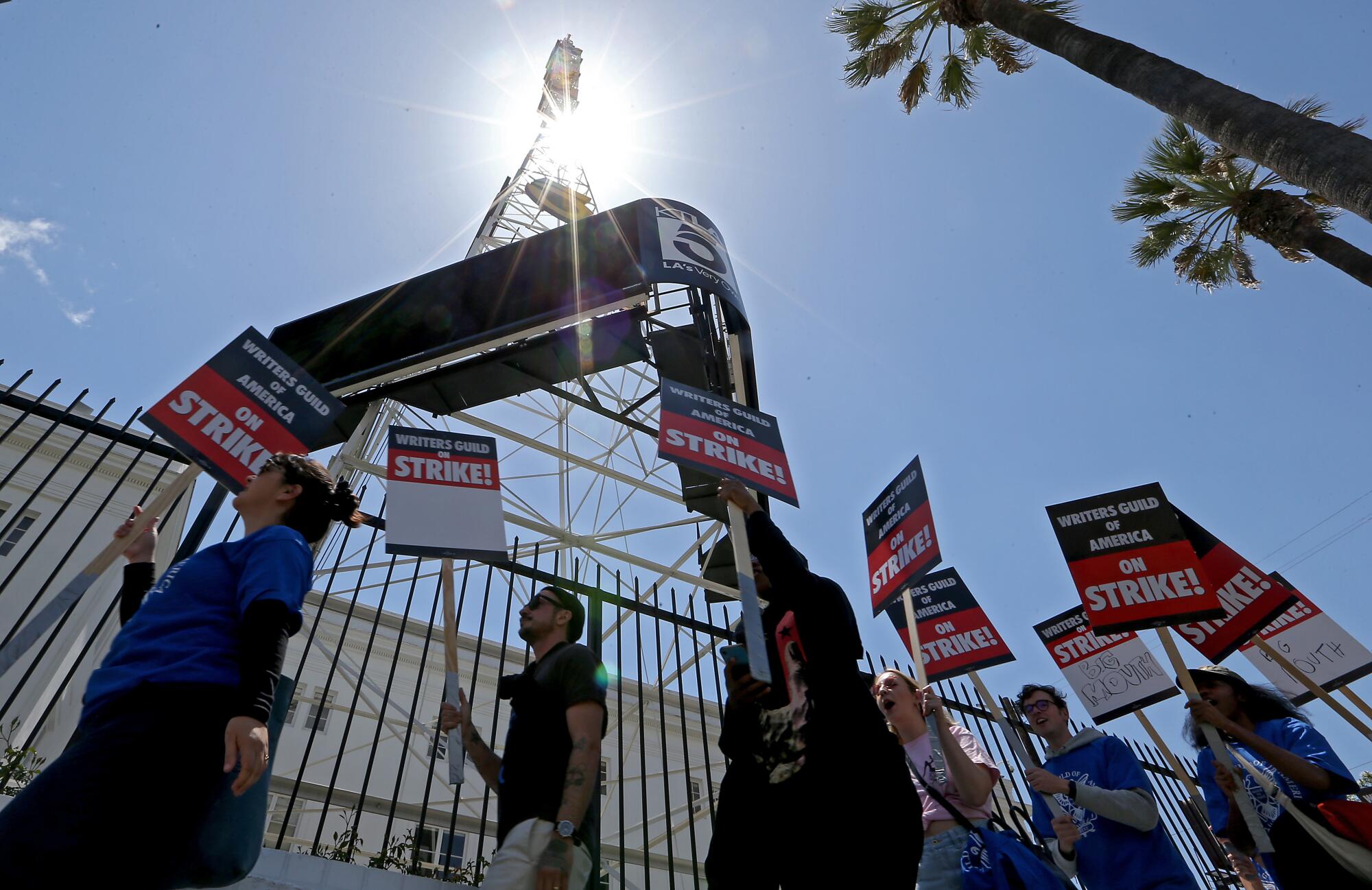 Striking Writers Guild of America workers picket outside the Sunset Bronson Studios on May 2.