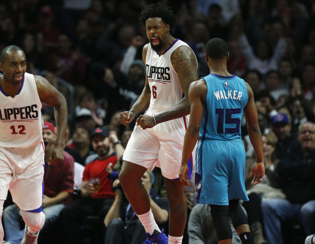 Clippers center DeAndre Jordan (6) reacts after a dunk against the Hornets in the second half.