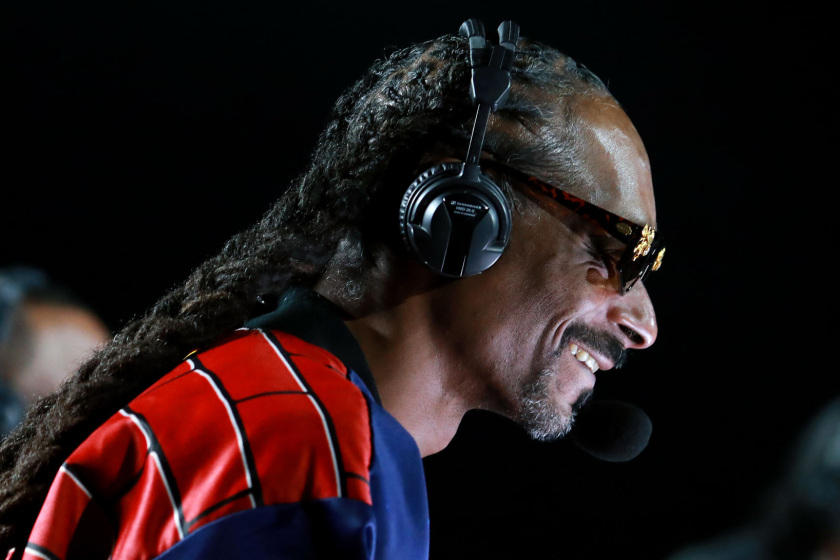 Snoop Dogg provides some boxing commentary during the Mike Tyson vs Roy Jones Jr. event.