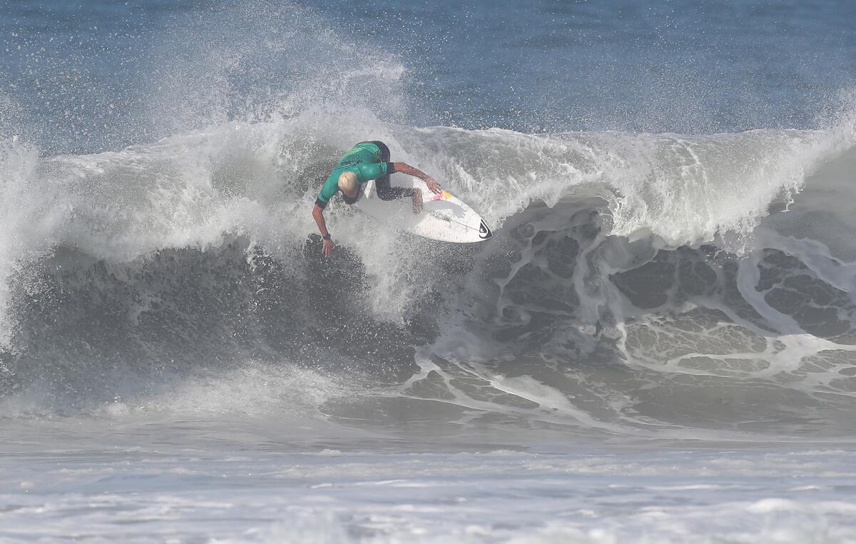 Brazil's Mateus Herdy goes over a difficult section of a closeout wave Tuesday in the second round of the U.S. Open.