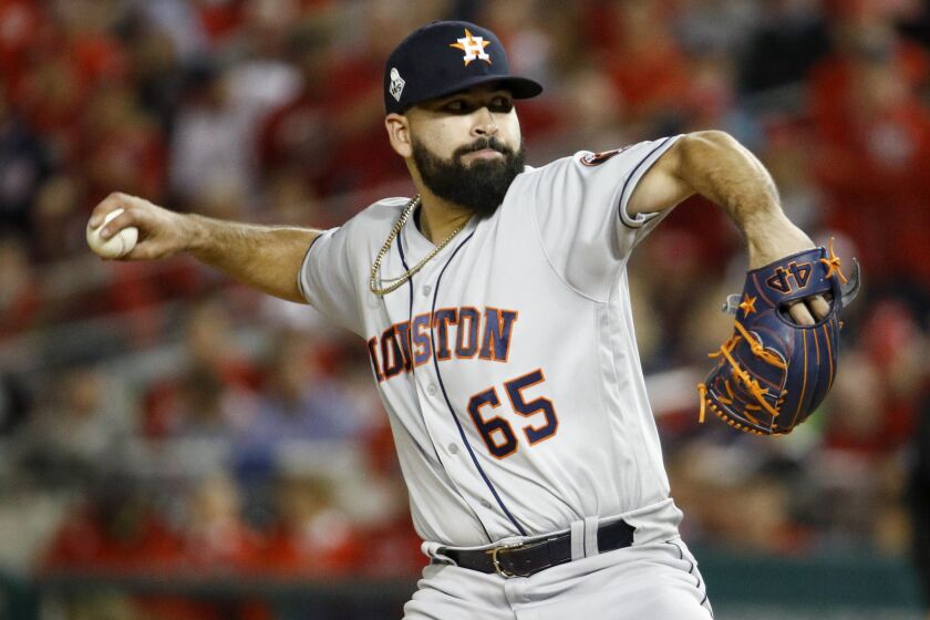 Houston Astros starting pitcher Jose Urquidy throws against the Washington Nationals during the first inning of Game 4 of the baseball World Series Saturday, Oct. 26, 2019, in Washington. (AP Photo/Patrick Semansky)