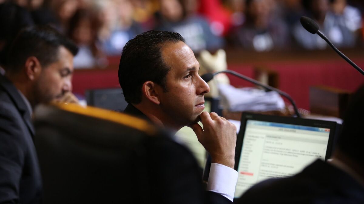 Los Angeles City Councilmember Mitch Englander listens as the council moved to the forefront of a national campaign to boost the incomes of low-wage workers on June 3, 2015.