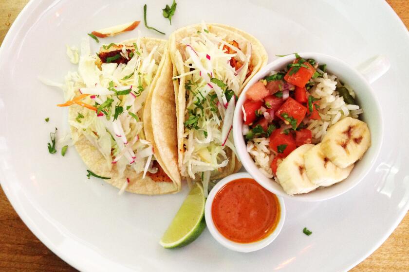 The fish tacos and poblano rice are part of the lunch special menu at Tabachines Cocina in downtown L.A.