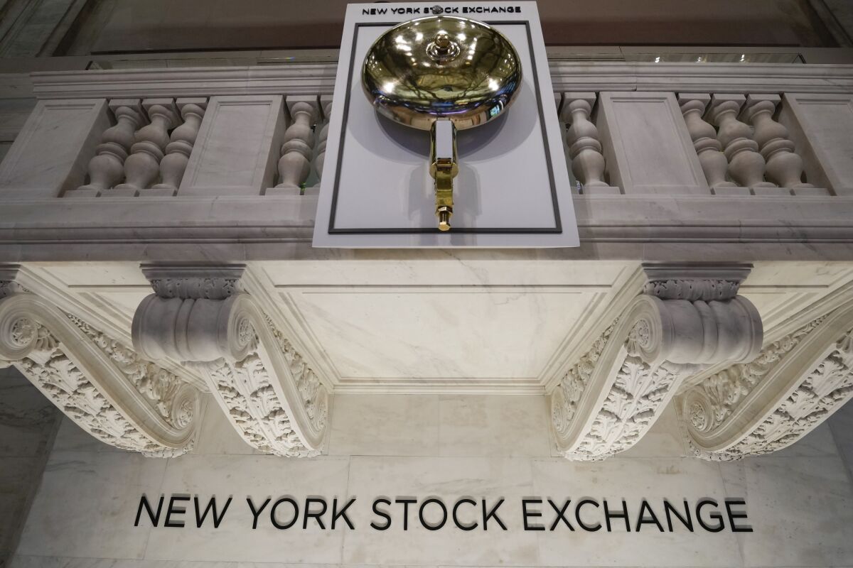 The opening bell is seen on the floor at the New York Stock Exchange in New York, Tuesday, March 28, 2023. (AP Photo/Seth Wenig)