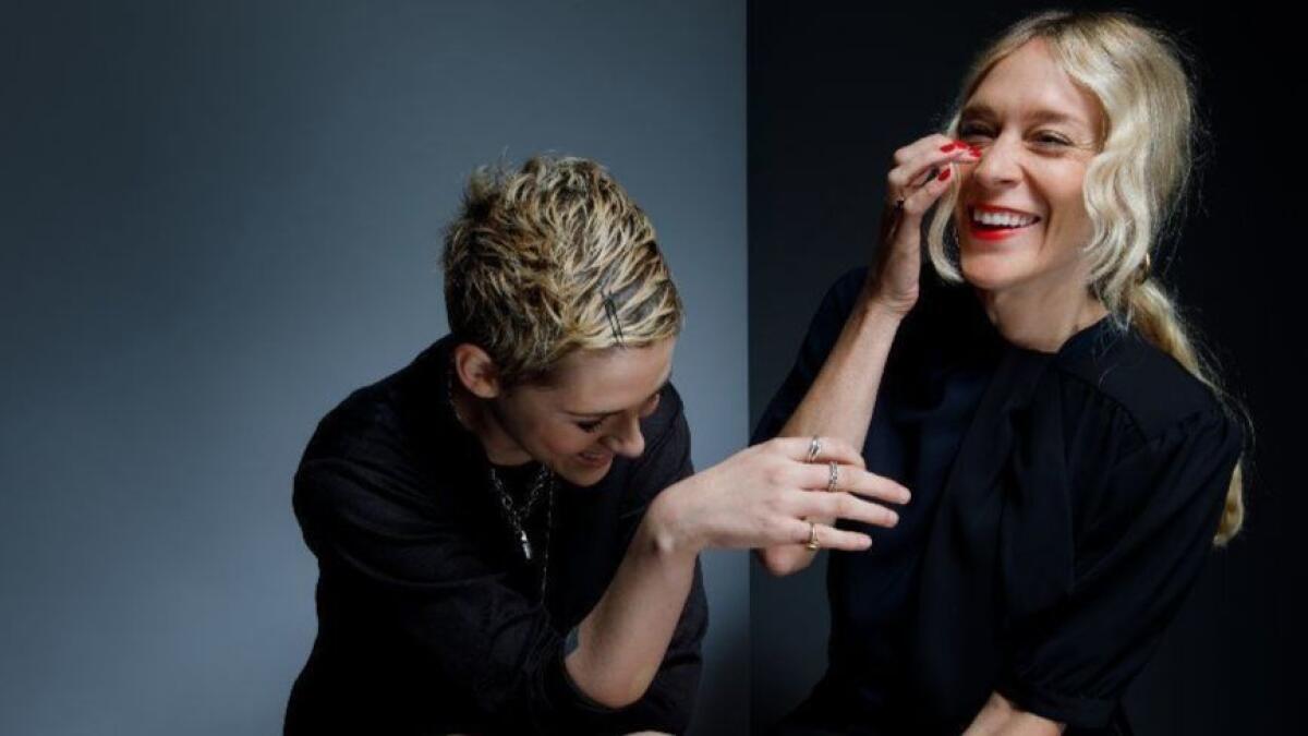 Kristen Stewart, left, and Chloe Sevigny share a laugh at the Four Seasons Hotel in Beverly Hills on Aug. 23.