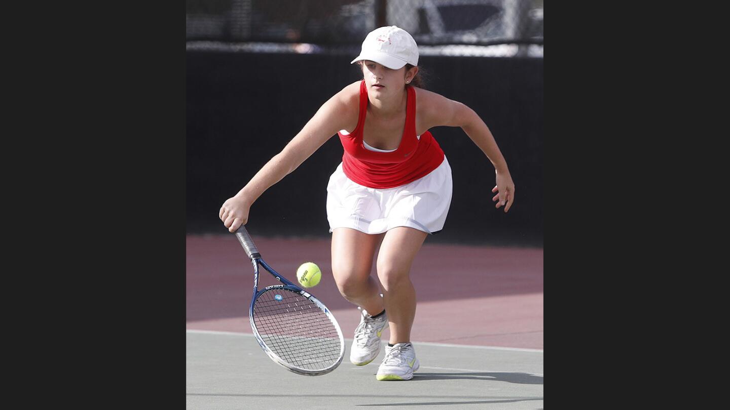 Glendale's Celine Khachiki chases down the ball for a backhand return in a singles against Hemet in a CIF Division IV girls' tennis semifinals at Glendale High School on Wednesday, November 8, 2017.