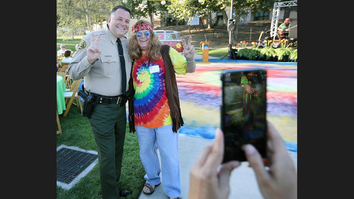Photo Gallery: La Cañada Flintridge Chamber of Commerce '60s-themed mixer and business expo at Olberz Park