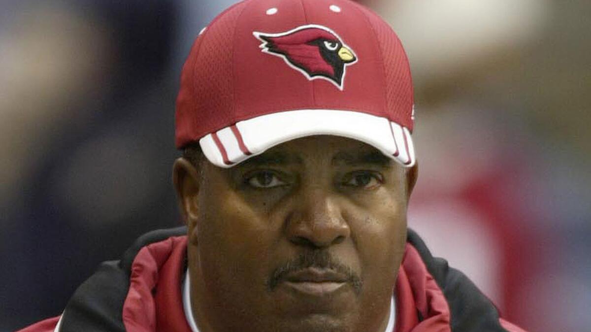 Dennis Green prepares to coach the Arizona Cardinals against the Seattle Seahawks in 2004.