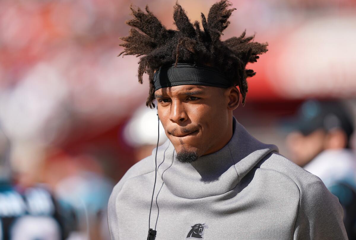 Carolina Panthers quarterback Cam Newton looks on from the sidelines during a game against the San Francisco 49ers on Oct. 27 in Santa Clara, Calif.