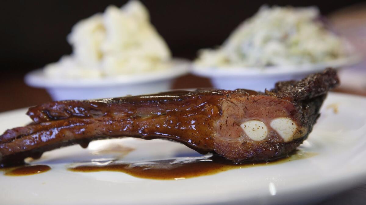 Baby back ribs at Dr. Hogly Wogly's Tyler Texas BBQ in Van Nuys. (Christian K. Lee / Los Angeles Times)