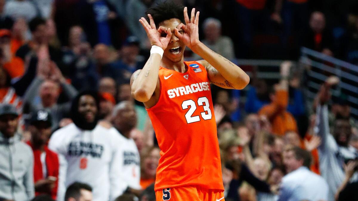 Syracuse guard Malachi Richardson celebrates after making a three-pointer against Virginia in the Midwest Regional final.
