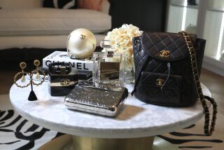 A select collection of vintage Chanel products is deplayed at the Designer Vault in Carlsbad. Consignment stores that sell items like these have gone through a stylish transformation as demand for pre-owned luxury items has increased.