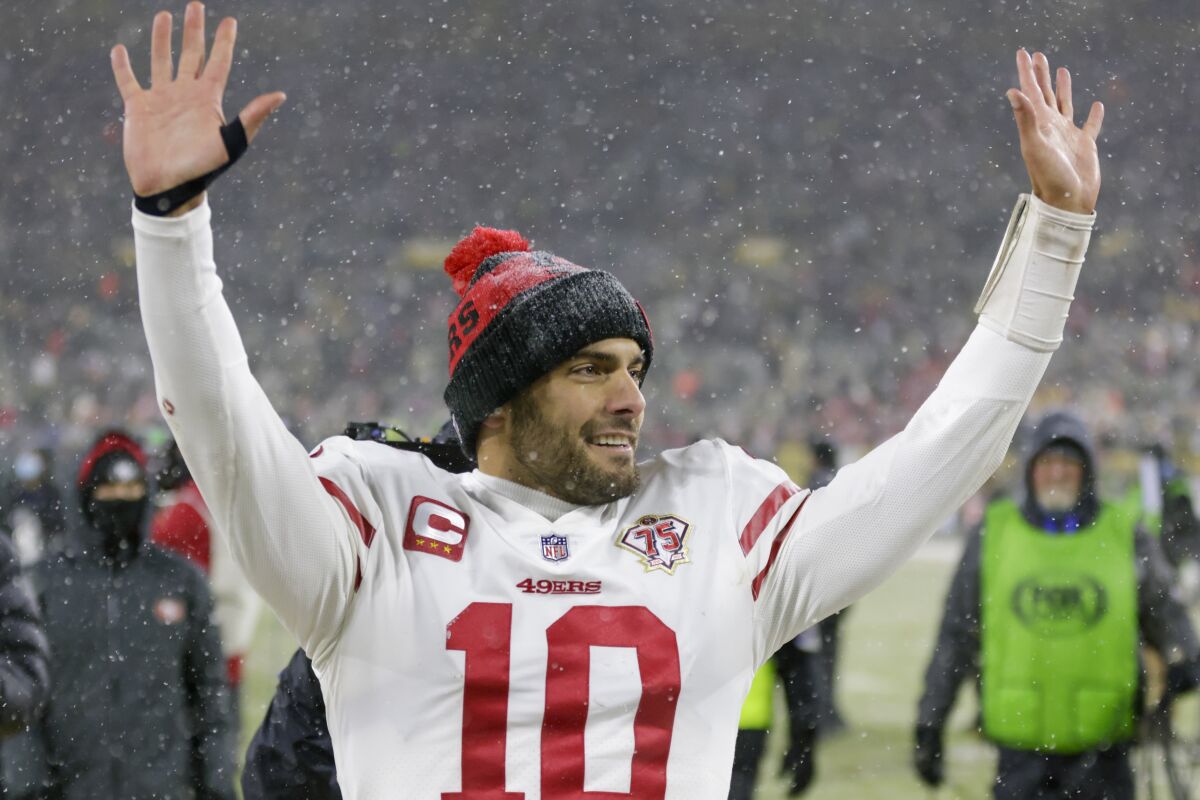 San Francisco quarterback Jimmy Garoppolo rejoices in the 49ers' comeback win.