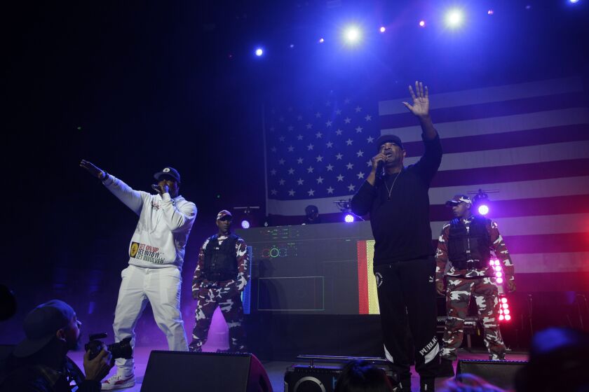 The Public Enemy hip hop band performs at a rally for Democratic presidential candidate Sen. Bernie Sanders, I-Vt., at Los Angeles Convention Center in Los Angeles Sunday, March 1, 2020. (AP Photo/Damian Dovarganes)