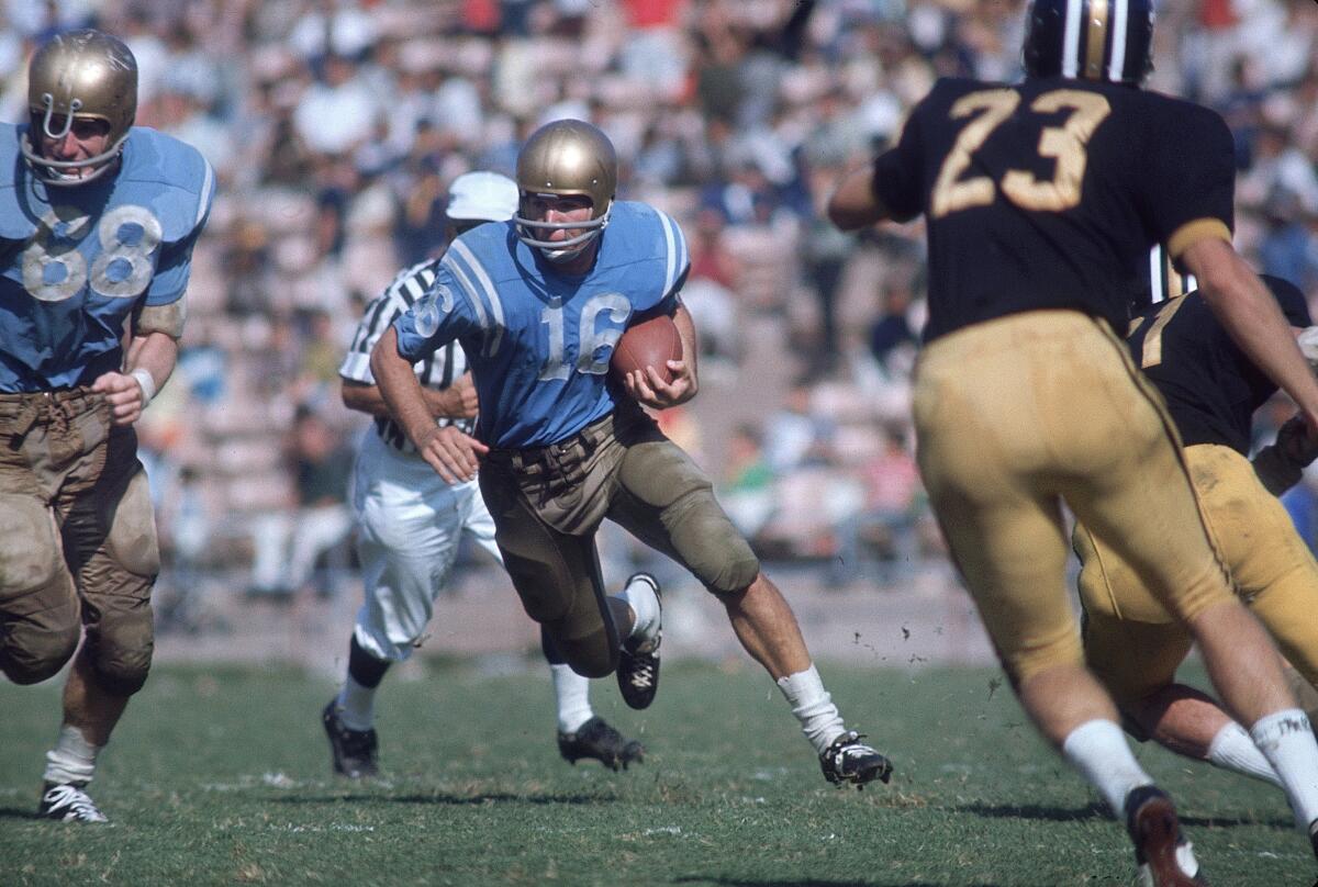 UCLA quarterback Gary Beban runs with the ball against Missouri in October 1966.