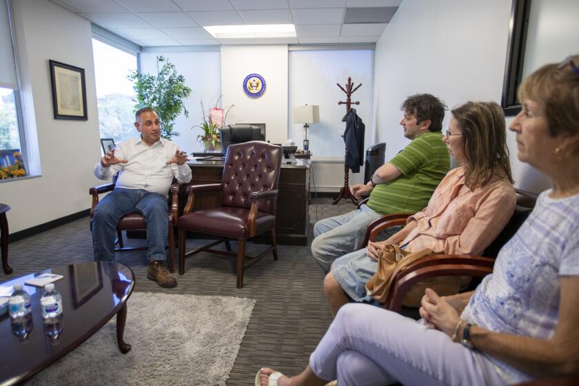 FULLERTON, CALIF. -- SUNDAY, JULY 21, 2019: Rep. Gil Cisneros hosts constituent office hours at his office in Fullerton Sunday, July 21, 2019. Photo taken in Fullerton, Calif., on July 21, 2019. (Allen J. Schaben / Los Angeles Times)