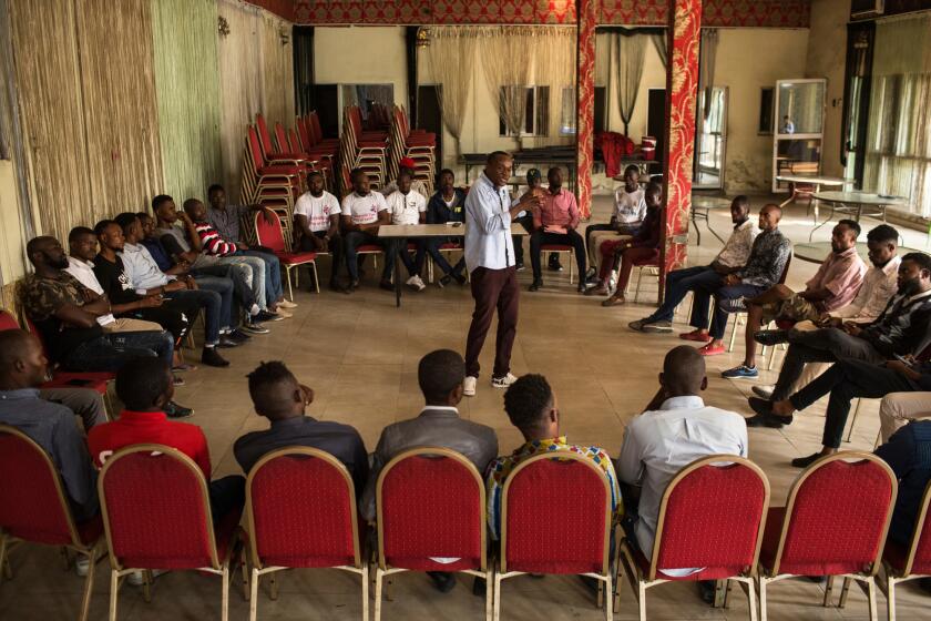 Alain Mulumba Kabeya, 28, the interim coordinator for the Kinshasa cell of Filimbi, a pro-democracy group whose name means "whistle" in Swahili, leads a secret meeting of the group in Kinshasa, DRC, Aug. 14, 2018. Filimbi members had just spent the day in court, supporting their imprisoned colleagues. After languishing nearly nine months in jail while they awaited a verdict, four of Filimbi's activists were recently convicted of Òdisturbing the public orderÓ and Òinsulting the head of stateÓ and sentenced to one year in prison.