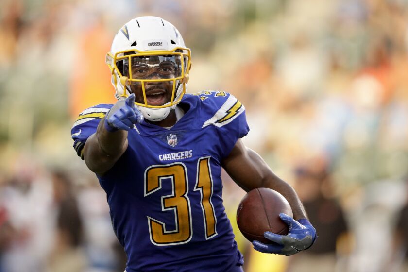 Los Angeles Chargers free safety Adrian Phillips celebrates his interception against the Cleveland Browns during the second half of an NFL football game Sunday, Dec. 3, 2017, in Carson, Calif. (AP Photo/Jae C. Hong)