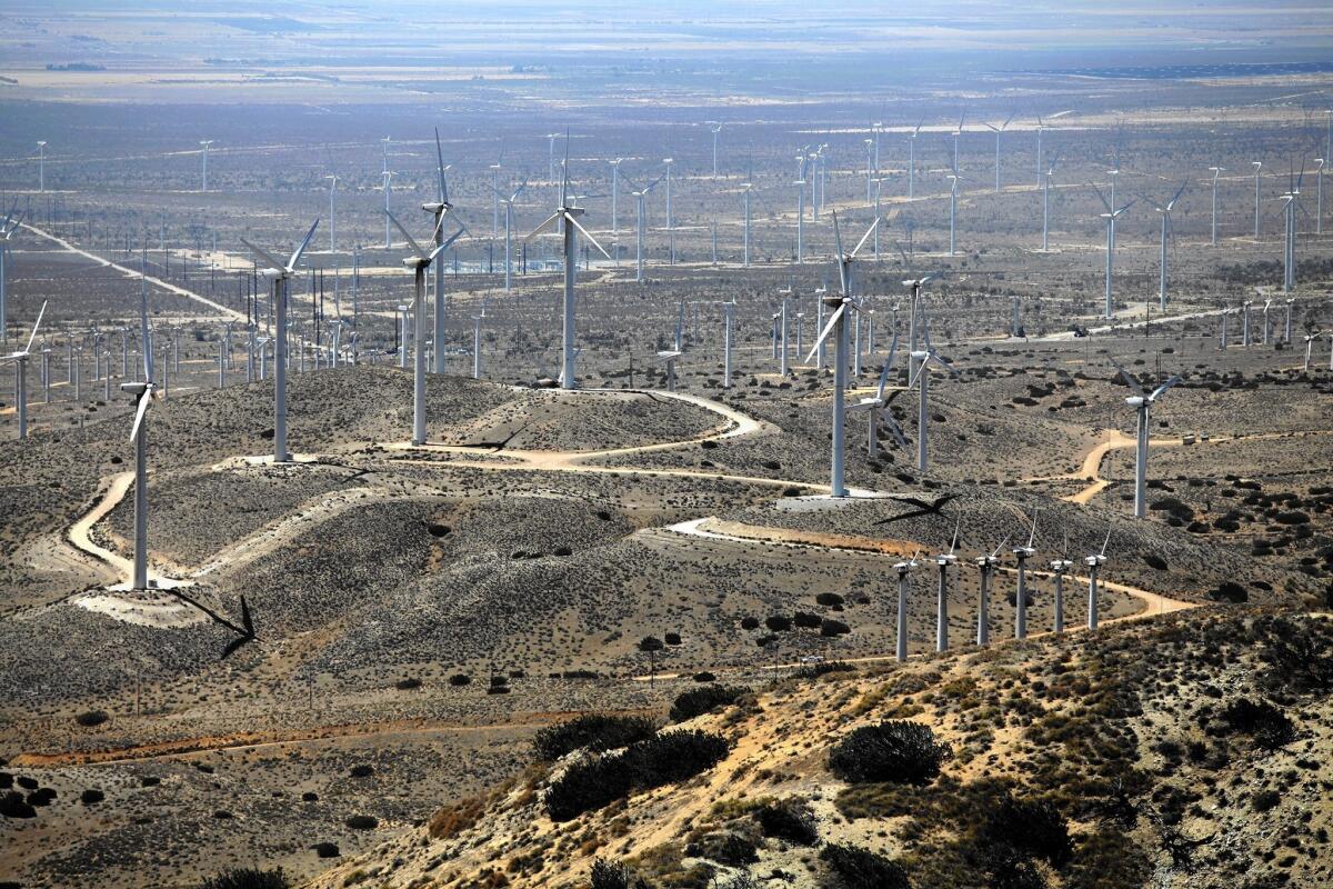 Wind turbines in the Tehachapi Mountains; Gov. Jerry Brown's proposal to significantly boost the amount of energy California derives from renewable sources could reinvigorate the state’s utility-scale solar and wind industries.