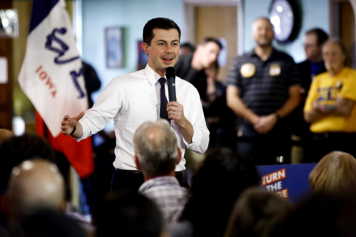 Former South Bend, Ind., Mayor Pete Buttigieg campaigns Saturday in Oelwein, Iowa.