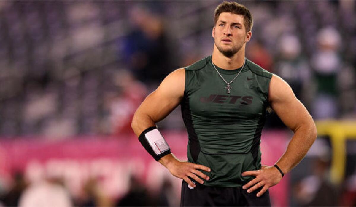 New York Jets backup quarterback Tim Tebow remained positive despite criticism in the press from some of his teammates.