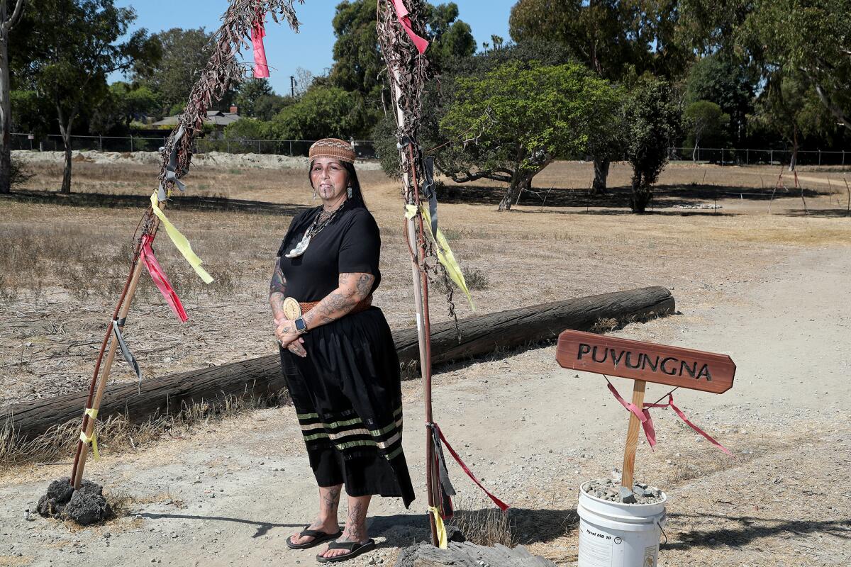 Heidi Lucero, the new chairwoman of the Juaneno Band of Mission Indians, poses at Puvunga, a sacred site in Long Beach.
