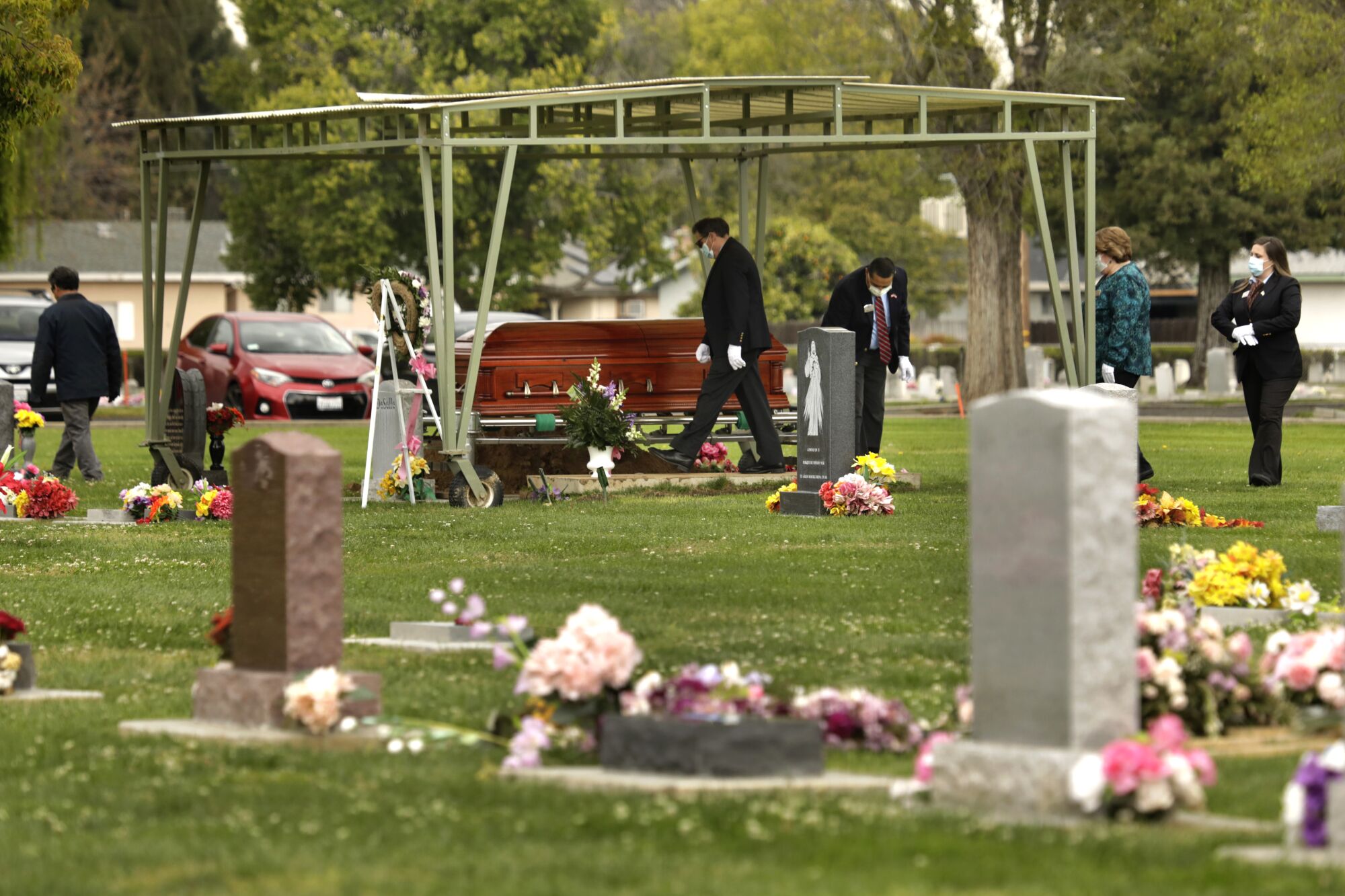 Wanda DeSelle's casket is brought to her gravesite.