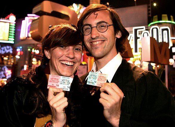 Jullian Lawson, 21, dressed as Lavender Brown, and Daniel Hurst, 22, as Harry Potter, were on hand for the midnight showing of " Harry Potter and the Half-Blood Prince" at Universal CityWalk.