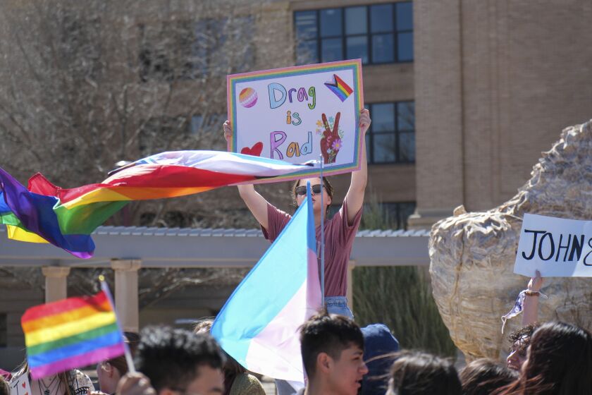 More than 50 people gathered Tuesday, March 21, 2023, at West Texas A&M University in Canyon, Texas, to protest the university president's decision to cancel a drag show on campus. (Michael Cuviello/Amarillo Globe-News via AP)