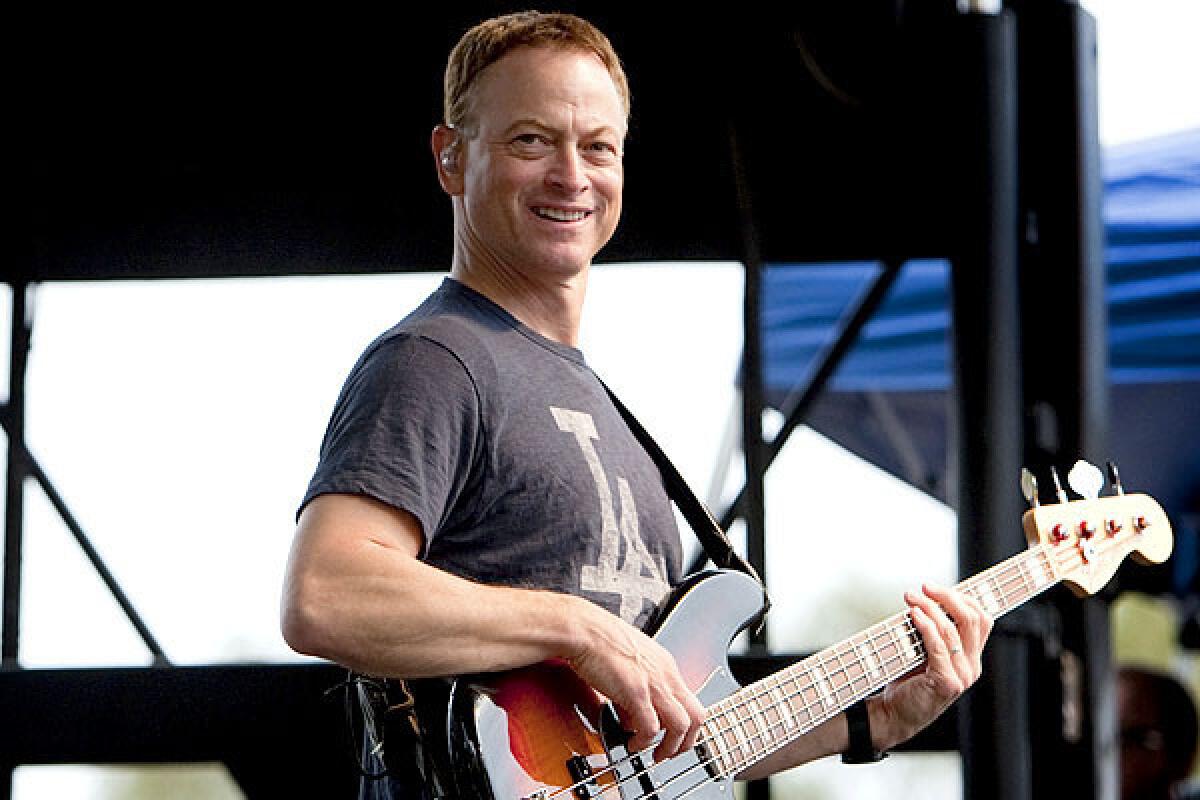 Actor Gary Sinise's half-acre estate holds a two-story farmhouse, a charming guest suite and a backyard with a pool, spa and koi pond.