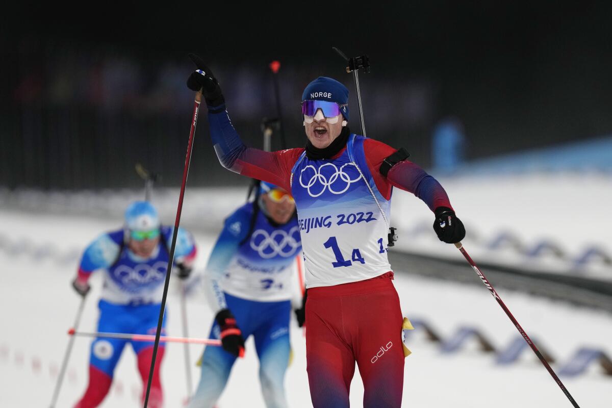 Johannes Thingnes Boe skis at the 2022 Olympics.