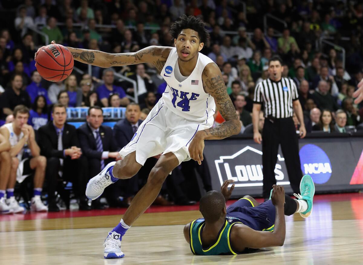 Duke forward Brandon Ingram (14) drives to the basket in the second half against North Carolina-Wilmington in the first round of the NCAA tournament.