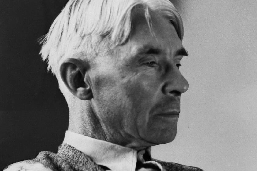 In this undated file photo American writer and poet Carl Sandburg poses for a photo. Poets and writers on both sides of the Atlantic at first cheered on the battles of World War I. Carl Sandburg's "Four Brothers" hailed the "Ballplayers, lumberjacks, ironworkers, ready in khaki/A million, ten million, singing, 'I am ready.' " (AP Photo/File)