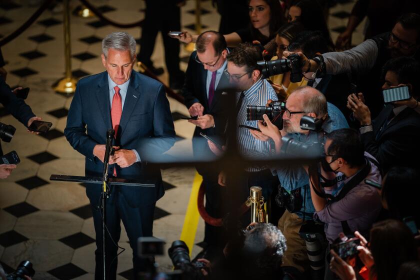 WASHINGTON, DC - MAY 24: Speaker of the House Kevin McCarthy (R-CA) stops to speak to members of the media gathered in National Statuary Hall at the U.S. Capitol on Wednesday, May 24, 2023 in Washington, DC. (Kent Nishimura / Los Angeles Times)