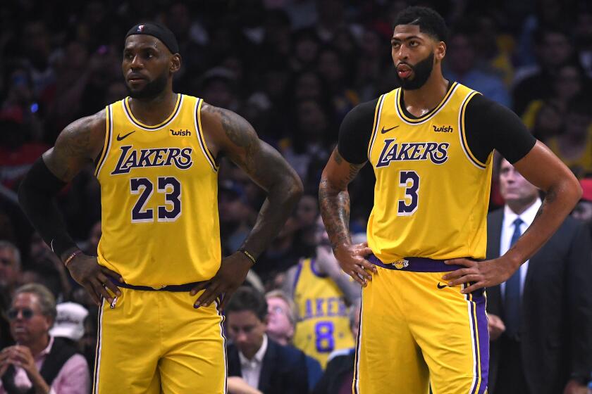 LOS ANGELES, CALIFORNIA - OCTOBER 22: LeBron James #23 and Anthony Davis #3 of the Los Angeles Lakers react as they trail the LA Clippers during the fourth quarter in a 112-102 Clippers win during the LA Clippers season home opener at Staples Center on October 22, 2019 in Los Angeles, California. (Photo by Harry How/Getty Images) ** OUTS - ELSENT, FPG, CM - OUTS * NM, PH, VA if sourced by CT, LA or MoD **