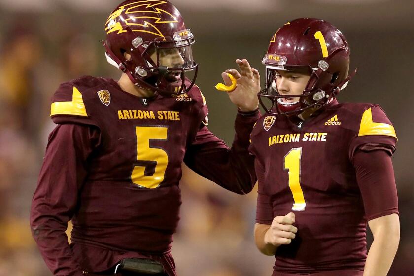 TEMPE, AZ - SEPTEMBER 23: Place kicker Brandon Ruiz #1 of the Arizona State Sun Devils celebrates with quarterback Manny Wilkins #5 after kicking a 41 yard field goal against the Oregon Ducks during the second half of the college football game at Sun Devil Stadium on September 23, 2017 in Tempe, Arizona. The Sun Devils defeated the Ducks 37-35. (Photo by Christian Petersen/Getty Images) ** OUTS - ELSENT, FPG, CM - OUTS * NM, PH, VA if sourced by CT, LA or MoD **