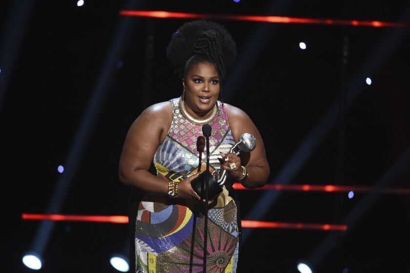 Lizzo wins the award for entertainer of the year at the 51st NAACP Image Awards at the Pasadena Civic Auditorium on Saturday, Feb. 22, 2020, in Pasadena, Calif. (AP Photo/Chris Pizzello)