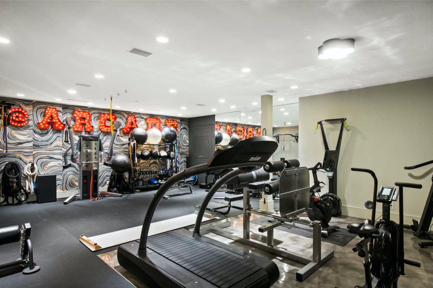 The gym with exercise equipment.