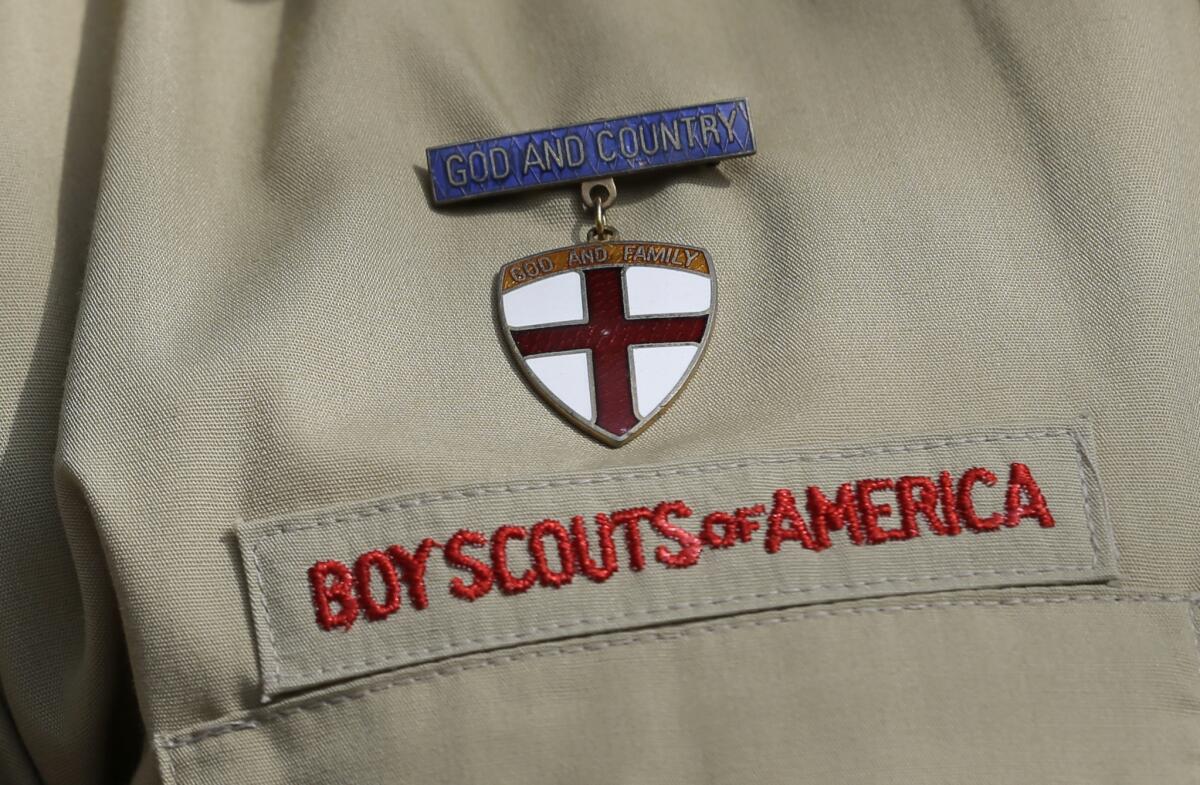 Close-up of a uniform shirt with the words "Boy Scouts of America" stitched above the breast pocket