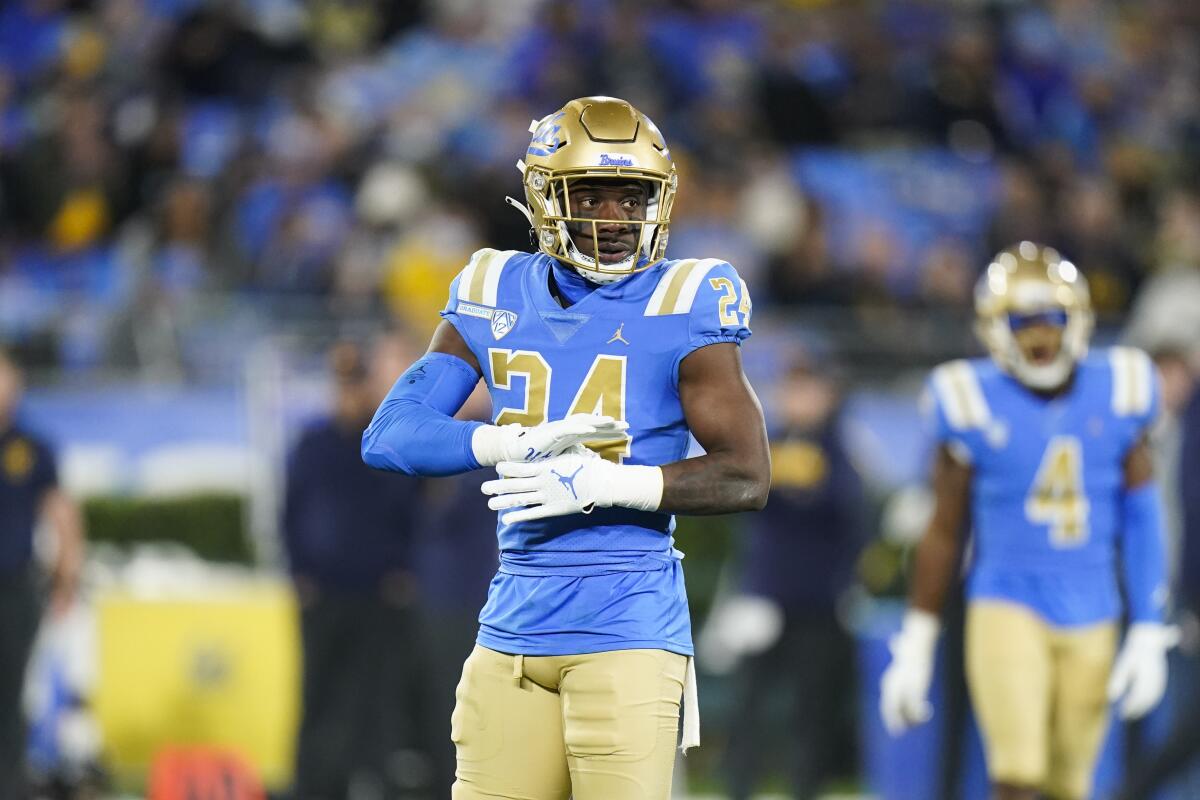 UCLA defensive back Qwuantrezz Knight stands on the field.