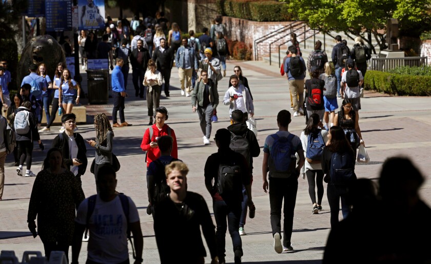 UCLA students walk on campus. 